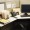 Computer and landline phone in office, elevated view